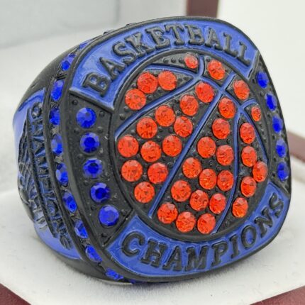 BASKETBALL CHAMPION RING --- BLACK BODY, BLUE PAINT, ORANGE STONES ON BALL (Item #52-20)